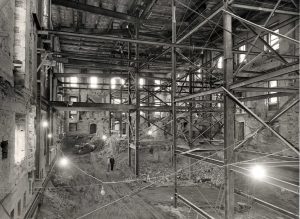 Completely gutted White House interior, circa 1950 - amazing b/c it looks like an empty warehouse including a bulldozer inside the walls