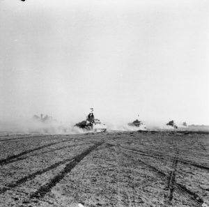 British tanks move up to the battle to engage the German armour after the infantry had cleared gaps in the enemy minefield, El Alamein, 1942 