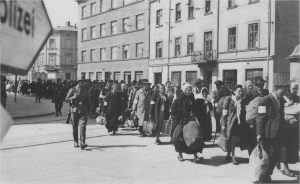 SS-guarded Jews marched to camps, 1943.