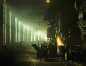 Steam locomotives sit in the Chicago and North Western Railway roundhouse at the Chicago freight yards, December 1942 [3 500 x 2 715]