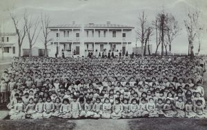 1900 Carlisle School, Native American assimilation era.