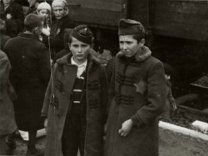 Newly-arrived siblings face fate at Auschwitz.