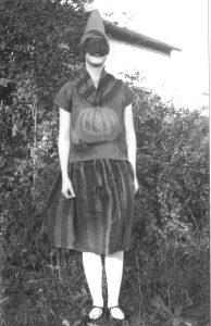 Girl in a Halloween costume, Ontario, Canada, 1928.