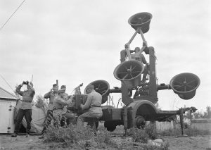 Finnish troops using binoculars/acoustic locator to track enemy aircraft (1941)