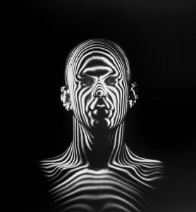 Light beams create a contour map of a human head during an Air Force study for jet-pilot helmets. Originally published on the cover of LIFE magazine on December 6, 1954 