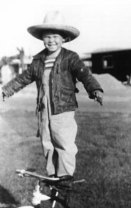 Jim Morrison as a child - playing and mugging for the camera 