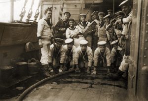 Holystoning the deck of the H.M.S. Pandora | 1913 | [2813 x 1960 @600dpi]