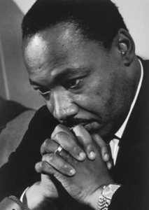 Dr. Martin Luther King contemplative and wearing a Rolex