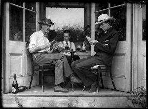 Playing cards in an alcove, 1900 