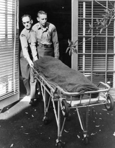 Medical personnel removing Marilyn's body from her home,  August 5, 1962.