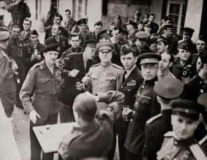 Marshal Zhukov decorates Field Marshal Montgomery with the Russian Order of Victory at General Eisenhower's Headquarters, Frankfurt, 10 June 1945 