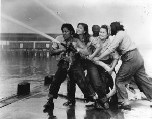 Female firefighters trained at Pearl Harbor shipyard, 1940s.