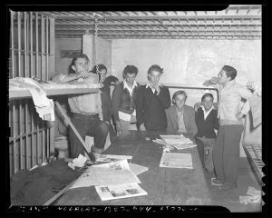 Group of male juveniles in jail cell after arrest for stealing automobiles Los Angeles, Calif., circa 1941 