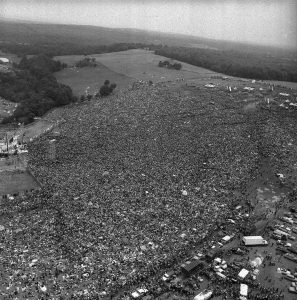 Woodstock 1969, famed for peace and music, gathered 400,000 people.