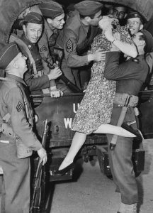 Martha O'Driscoll - kissing a soldier goodbye in Los Angeles, 1941.