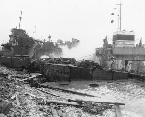 Landing craft beached during the Normandy storm, Omaha Beach, 21 June 1944 