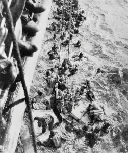 HMS Dorsetshire picking up Bismarck survivors; 27 May 1941 