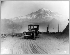 1919 Detroit Electric car tours mountain terrain.