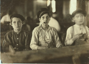 Young cigar makers working in Tampa, Florida  in 1909. Photographed by Lewis Hine, a social reformer who advocated for improved child-labor laws. 