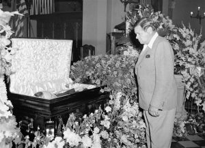 Babe Ruth honoring rival, Lou Gehrig, at his funeral, 1941.