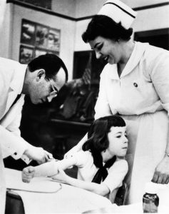 Doctor Jonas Salk's polio vaccine, a landmark in medical history, 1954.