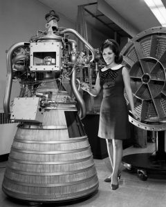 Miss NASA posed with the RL-10 rocket engine, 1968.