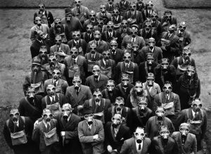 Postal workers trained with gas masks in 1937 England.