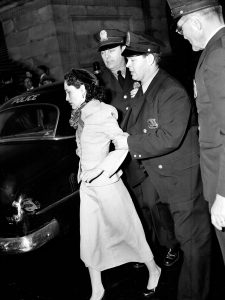 Lolita Lebron, Puerto Rican nationalist leader, being arrested, 1954.