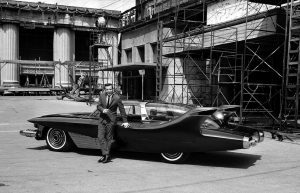 Singer Bobby Darin stands beside his dream car in Hollywood, 1961.