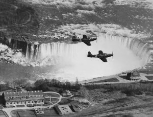 Soviet lend-lease Bell P-63 Kingcobra's in flight over Niagara Falls, ca.1943 