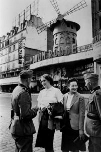 Unexpected German-French interaction, by the Moulin Rouge theatre, 1940.