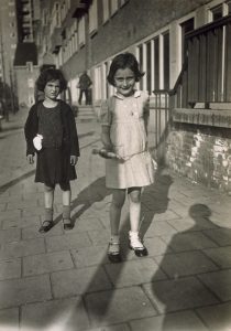 Anne Frank and her friend Sanne Ledermann stood together in 1935.