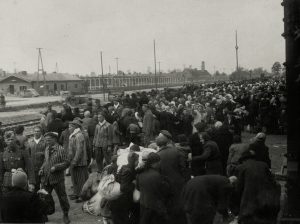 Jews await selection at the Auschwitz-Birkenau railway ramp, Poland, May 1944 