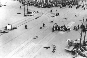 People gather on 'the Dam' in Amsterdam to welcome the Canadians. Frustrated German soldiers start shooting on the crowd. 1945 