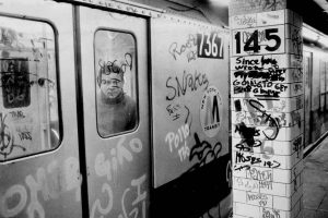 Subway graffiti & decay, financial crisis, breakdowns & delays, homelessness & panhandling, strained race relations.