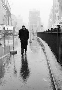 James Dean strolled through New York City's rain-soaked streets in 1955.