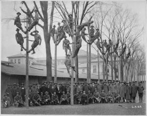 Students climb poles to learn wiring in 1918!