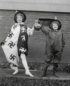 Halloween in 1918, amid the Spanish Flu pandemic, multipurpose masks.
