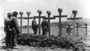 Fallschirmjagers mourn their fallen Kameraden after the battle of Crete. 